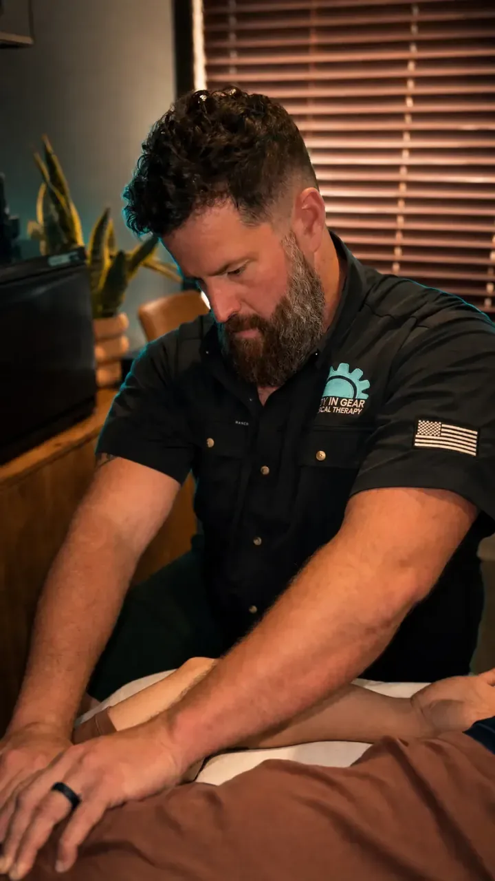 Myofascial release for chronic low back pain during a medical massage session at Body In Gear